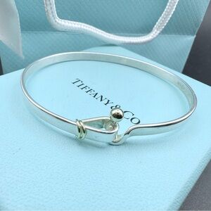 Authenticated Tiffany & Co. Silver & 18K Gold Hook Eye Bangle Bracelet Vintage